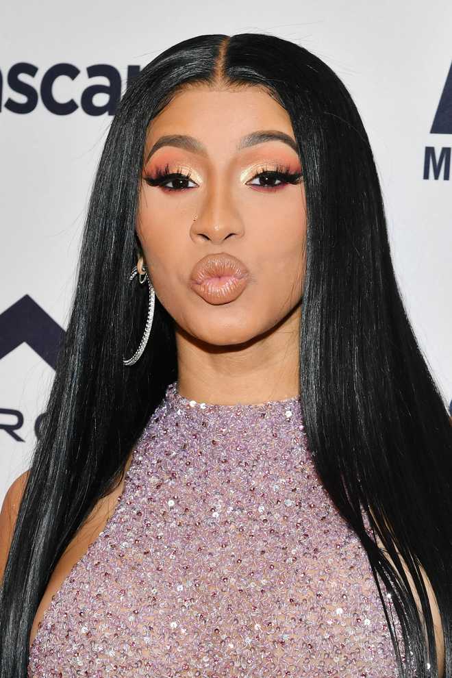 Rapper Cardi B faces felony charges over strip club fight : The Tribune ...