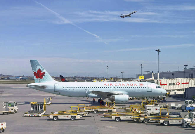 Woman passenger wakes up to find herself forgotten on empty Air Canada plane