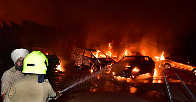 Fire destroys 14 cars in godown
