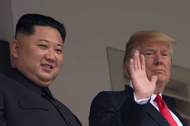 Trump says open to stepping into North Korea with Kim