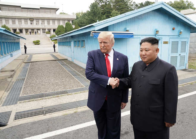 In historic first, Trump meets N Korea''s Kim at DMZ between two Koreas