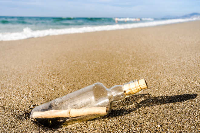 Boy finds 50-year-old message in a bottle on remote Australian beach