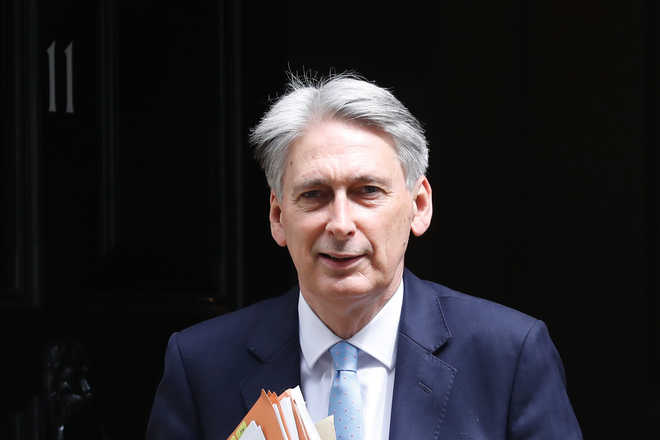 UK finance minister says will quit if Johnson becomes PM