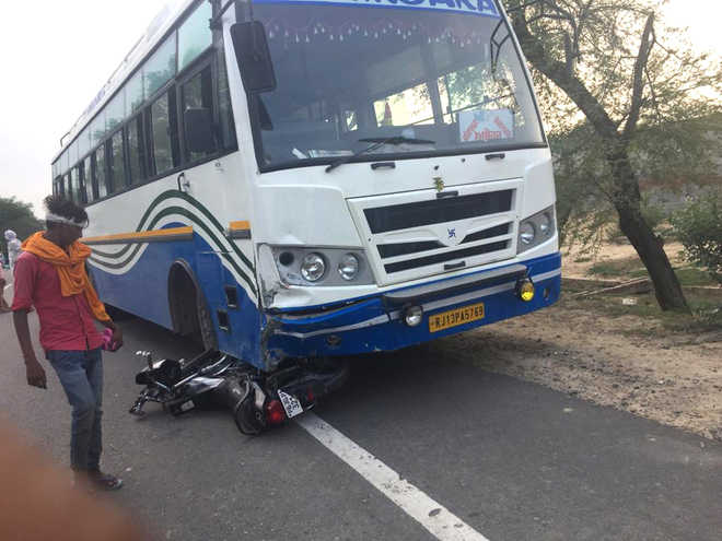 Bus crushes biker to death