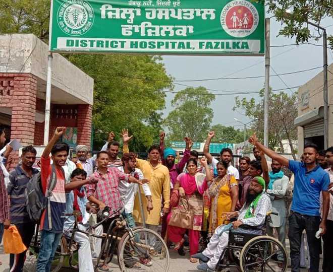 Protest against delay in issuing disability certificates