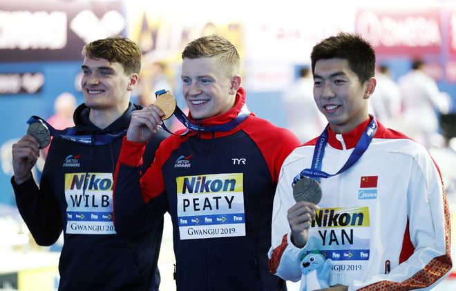 Peaty wins breaststroke gold, targets ‘low 56’ for 2020