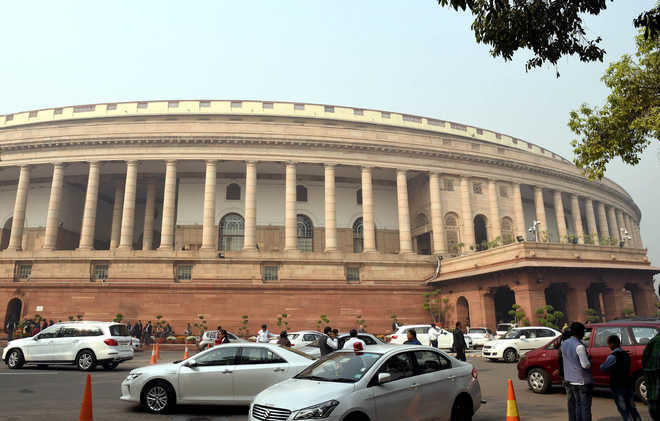 LS conducts legislative business amid chaos as govt moves resolution on ...