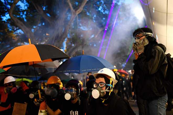 Hong Kong mops up after weekend of violence, braces for more protests