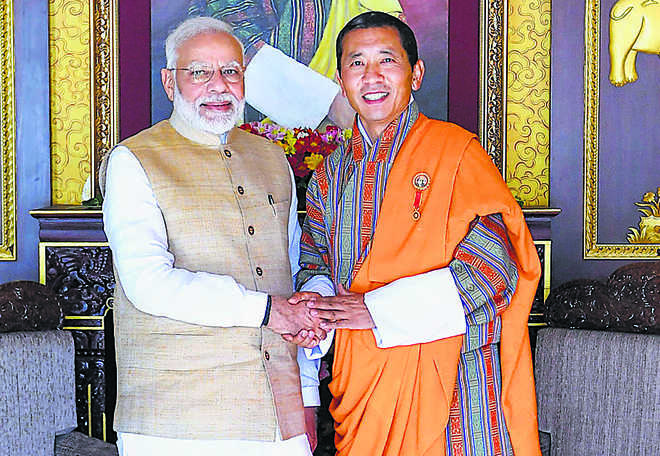 India, Bhutan boost ties with pacts on space research, IT
