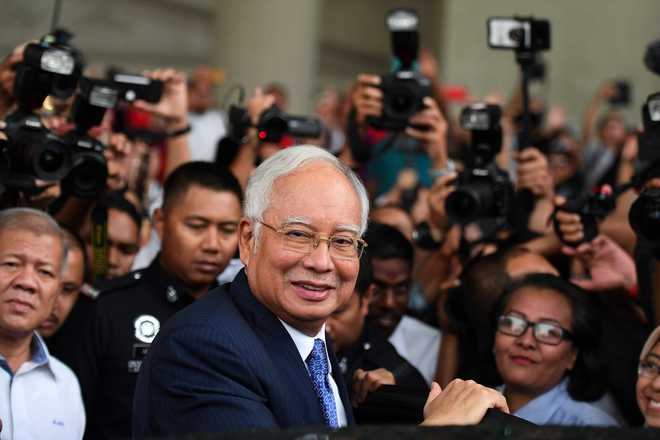 Judge postpones 2nd corruption trial of Malaysia’s former PM Najib