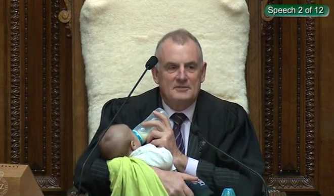 New Zealand Speaker cradles MP''s baby in parliament