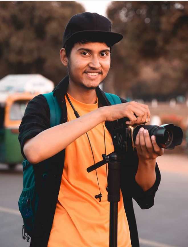 A indian boy pose for camera for fashion shoot Stock Photo - Alamy