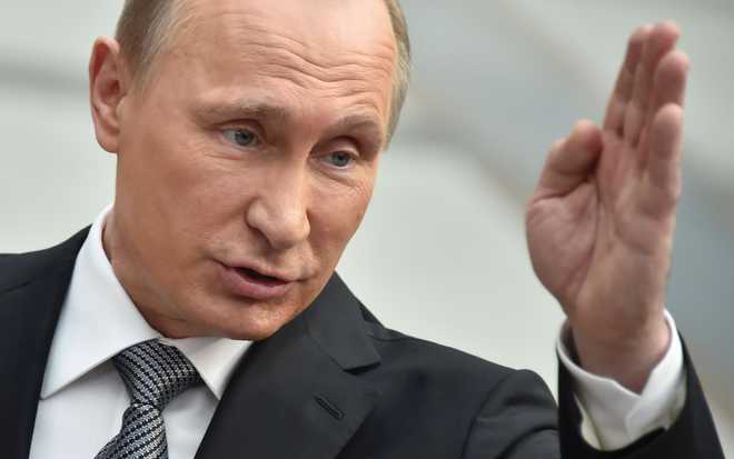Russia’s Putin vows ‘symmetric response’ to US missile test