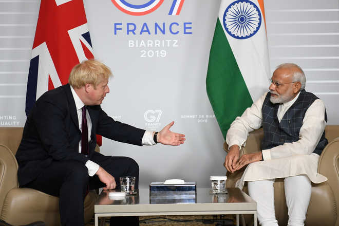PM Modi meets UK counterpart Boris Johnson in France
