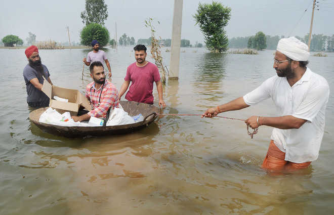Flood-hit throng health camps
