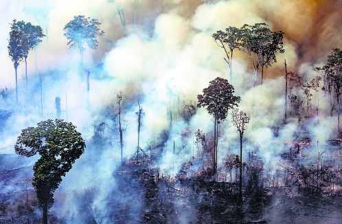 Brazil fights Amazon fires, hundreds more flare up