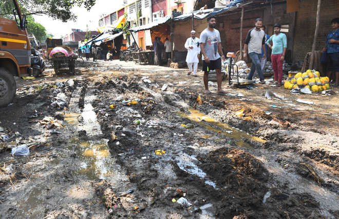 Sec 26 vegetable market dotted with potholes