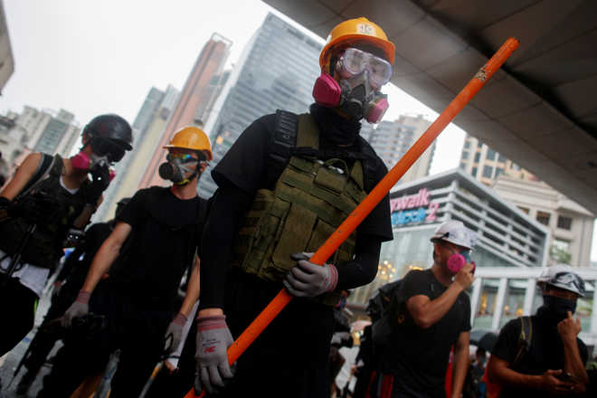 Battered HK faces economic recession, existential crisis