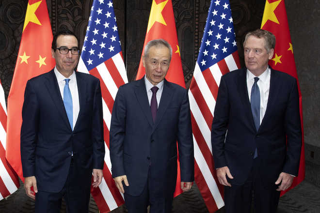China willing to resolve trade dispute with US via dialogue: Paper