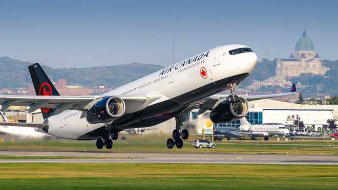 Exit or ''sortie''? Air Canada fined for not using French language