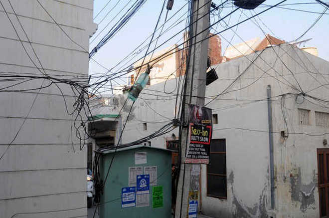 Residents see red over dangling, naked wires