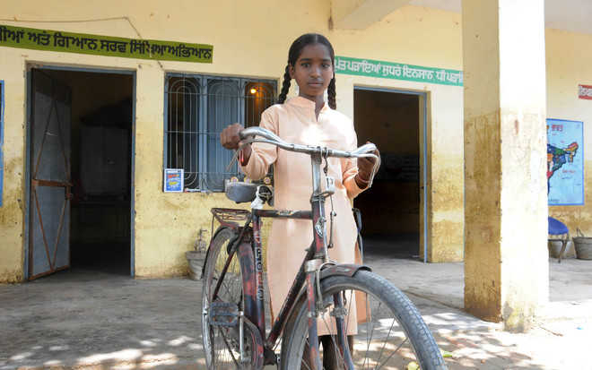 Roads damaged, 12-yr-old pedals for 6 km to school