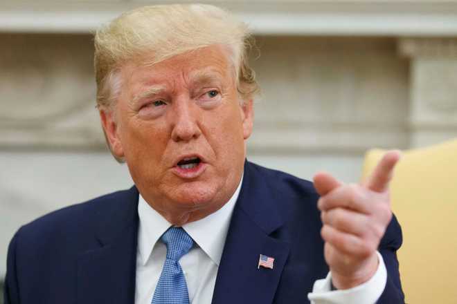 US ‘locked and loaded’ to respond to Saudi oil attack, says Trump